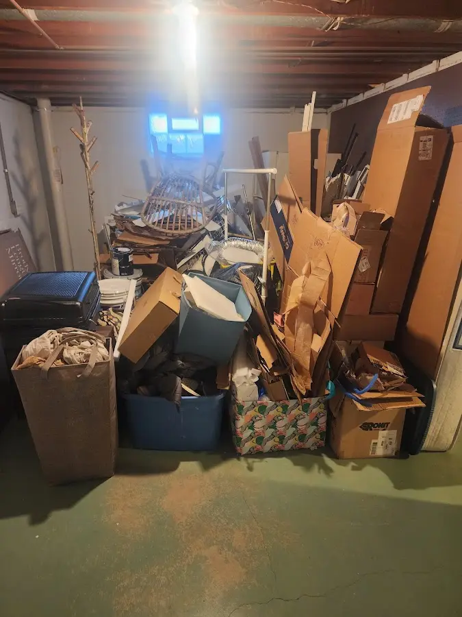 Roll-off dumpster container at job site for 8 Yard Dumpster Rental in Caribou